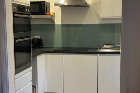 Apartment | Private kitchen | Fridge, microwave, oven, stovetop