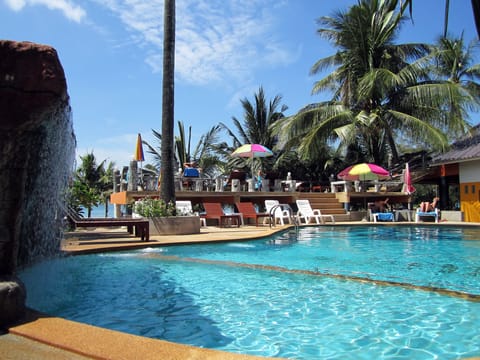 Outdoor pool, open 8:00 AM to 6:00 PM, pool umbrellas, sun loungers