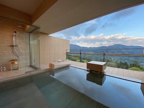 Standard Suite, Non Smoking, Mountain View | Bathroom | Separate tub and shower, spring water tub, rainfall showerhead