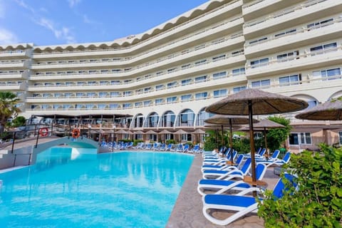 Seasonal outdoor pool, open 10:00 AM to 6:00 PM, pool umbrellas