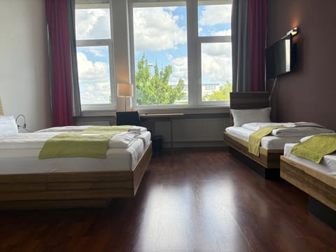 Quadruple room | Hypo-allergenic bedding, in-room safe, desk, soundproofing