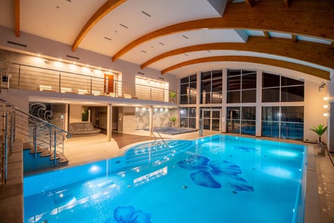Indoor pool, open 9:00 AM to 9:00 PM, sun loungers, lifeguards on site