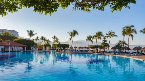 Outdoor pool, open 8:00 AM to 8:00 PM, pool umbrellas, sun loungers