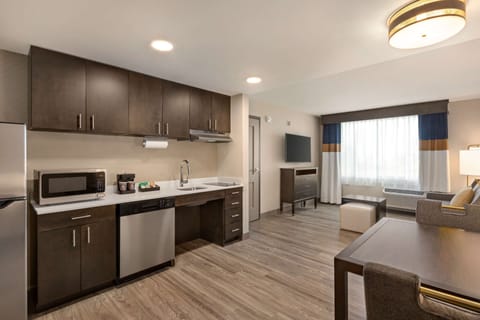 Suite, 2 Queen Beds, Accessible, Bathtub (Mobility & Hearing) | Living area | 50-inch flat-screen TV with cable channels, TV