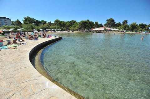 Apartment, 3 Bedrooms, Terrace, Garden View | Beach