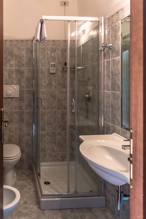 Shower, rainfall showerhead, hair dryer, towels