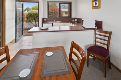 Superior Garden Apartment | Private kitchen | Full-size fridge, microwave, oven, stovetop