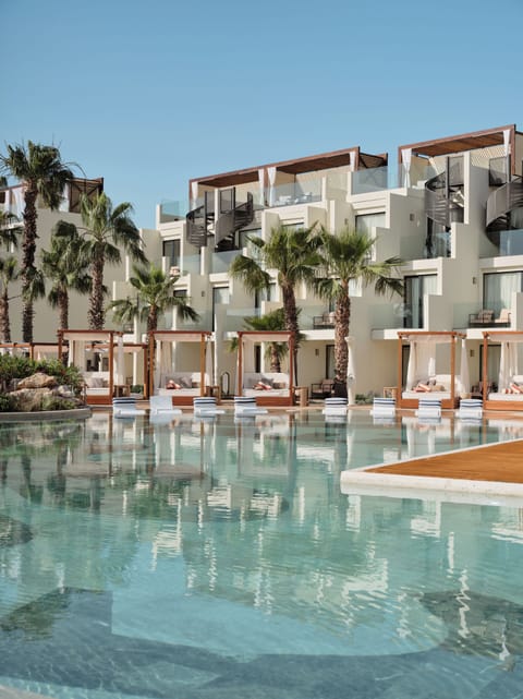 3 outdoor pools, open 10:00 AM to 7:00 PM, pool umbrellas, sun loungers