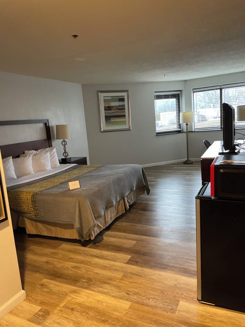 Premium bedding, Tempur-Pedic beds, desk, laptop workspace