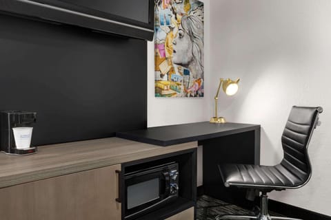 Premium bedding, desk, blackout drapes, iron/ironing board