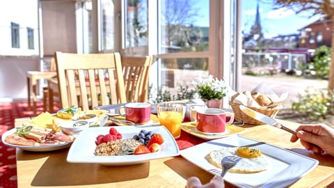 Daily buffet breakfast (EUR 28 per person)