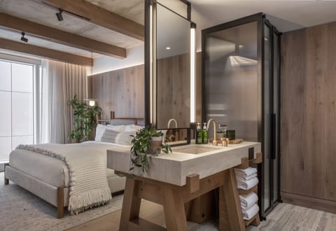 Premium bedding, down comforters, pillowtop beds, minibar