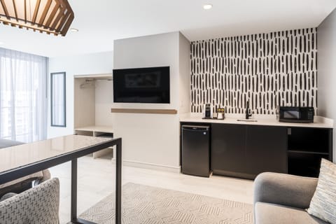 Studio Suite, 1 King Bed, Balcony | Living area | 55-inch flat-screen TV with digital channels, TV