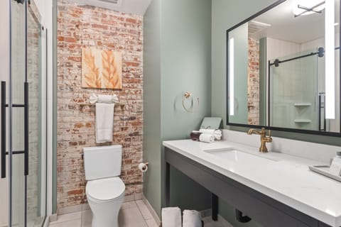 Classic Room, 1 King Bed, River Front | Bathroom | Shower, designer toiletries, hair dryer, towels