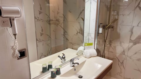 Room, Multiple Beds | Bathroom | Shower, eco-friendly toiletries, towels, soap