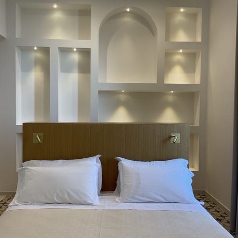 Deluxe Double Room, Balcony | In-room safe, desk, laptop workspace, bed sheets
