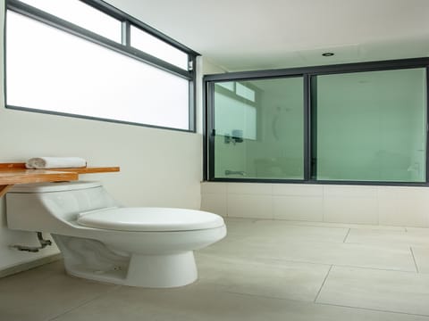 Superior Room, 1 King Bed | Bathroom | Shower, designer toiletries, towels, soap