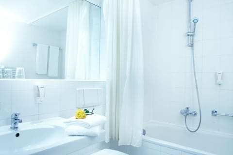 Eco-friendly toiletries, hair dryer, towels