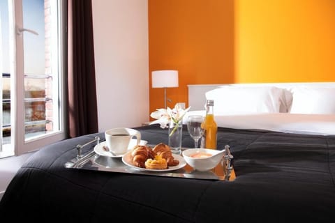 Premium bedding, desk, laptop workspace, soundproofing