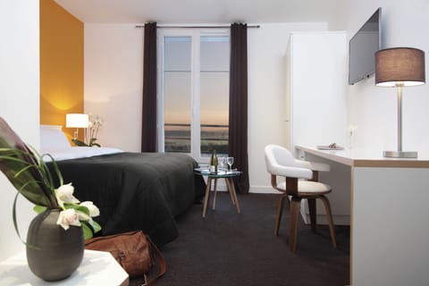 Premium bedding, desk, laptop workspace, soundproofing