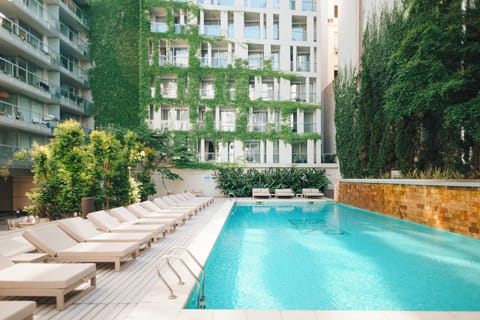 Outdoor pool, pool umbrellas, sun loungers