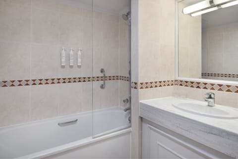 Combined shower/tub, eco-friendly toiletries, hair dryer, towels