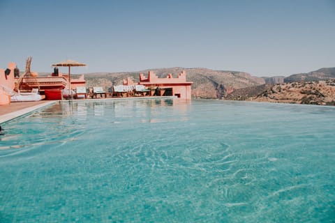 2 outdoor pools, open 8:00 AM to 9:00 PM, free cabanas, pool umbrellas