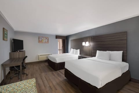 Desk, blackout drapes, iron/ironing board, free cribs/infant beds