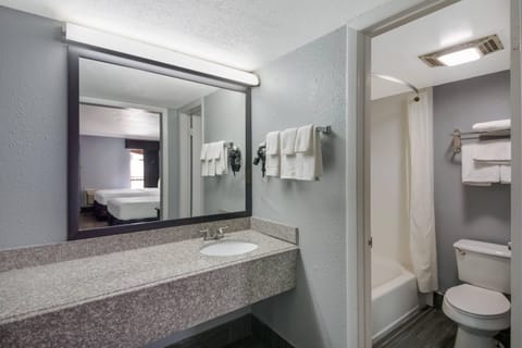 Standard Room, 2 Queen Beds, Non Smoking | Desk, blackout drapes, iron/ironing board, free cribs/infant beds