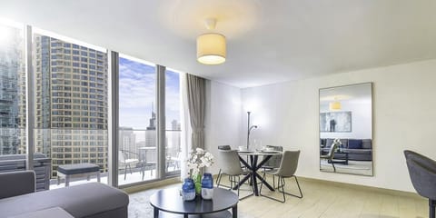 Deluxe Apartment | Living area | 55-inch Smart TV with cable channels, TV