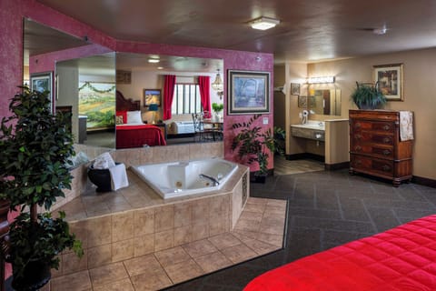 Romantic Room | Pillowtop beds, desk, laptop workspace, blackout drapes