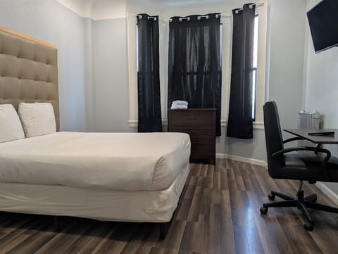 Deluxe Room (with Shared Bathroom) | Premium bedding, down comforters, desk, free WiFi