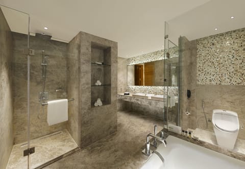 Shower, designer toiletries, hair dryer, bathrobes