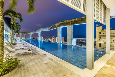 Outdoor pool, open 10:00 AM to 8:00 PM, sun loungers