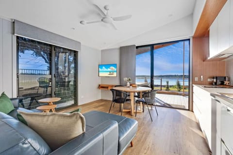 Premium Cabin - Sleeps 5 | Living area | 52-cm flat-screen TV with digital channels, DVD player