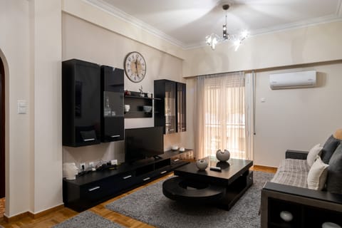 City Apartment | Living area | 40-inch flat-screen TV with digital channels, TV