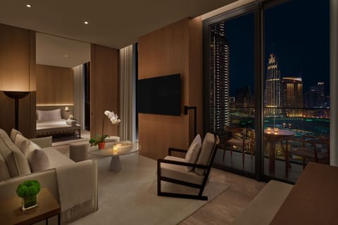 Superior Suite, 1 Bedroom, Balcony | Living room | 65-inch LCD TV with satellite channels, TV, iPod dock