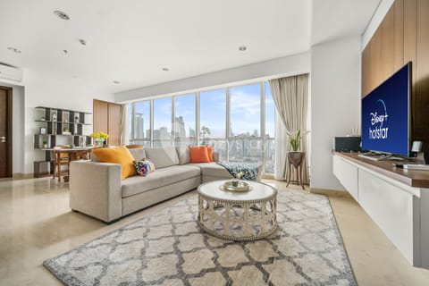 Apartment, 3 Bedrooms, City View | Living area | 43-inch Smart TV with cable channels, TV, Netflix