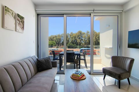 Executive Apartment | Living area | 43-inch Smart TV with cable channels, TV