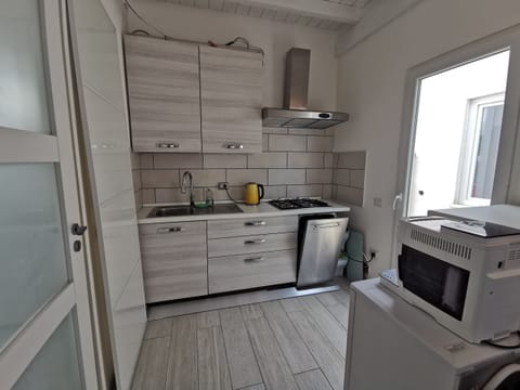 Apartment | Private kitchen | Fridge, stovetop, dishwasher, electric kettle