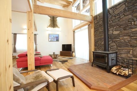 Luxury Villa | Living area | 50-inch Smart TV with cable channels, TV, Netflix