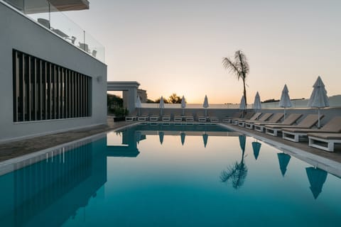 2 outdoor pools, pool umbrellas, sun loungers