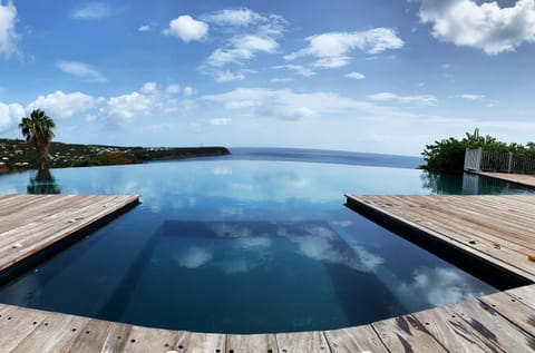 Outdoor pool, open 7:00 AM to 8:00 PM, sun loungers