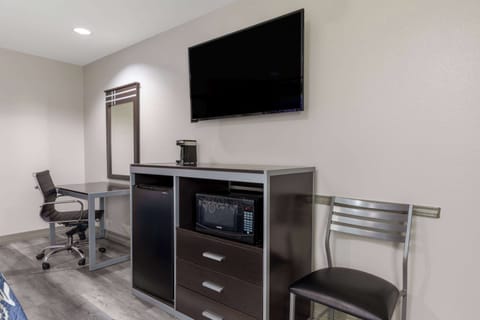 Pillowtop beds, desk, blackout drapes, iron/ironing board