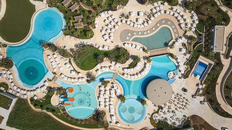 Indoor pool, outdoor pool, open 9:00 AM to 6:30 PM, cabanas (surcharge)