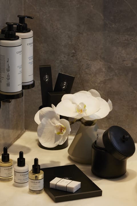 Rainfall showerhead, eco-friendly toiletries, bathrobes, slippers