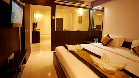 Deluxe Family Suite Non AC | In-room safe, desk, free WiFi, bed sheets