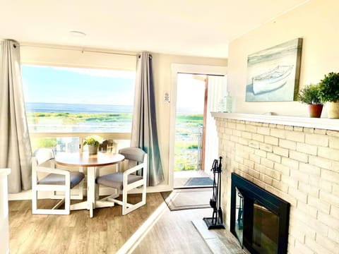 Basic Room (No Pets or Children under 16) | Living area | Flat-screen TV