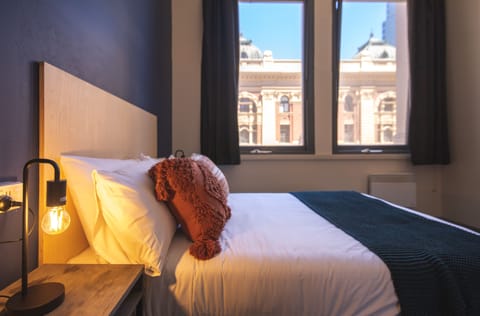 Compact Private Room, Shared Bathroom | Blackout drapes, soundproofing, bed sheets