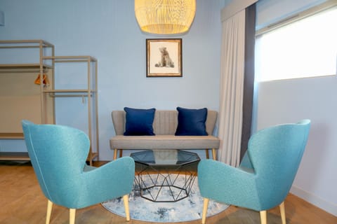 Premium Double Room, 1 King Bed, Resort View | Living area | 43-inch Smart TV with digital channels, TV, Netflix